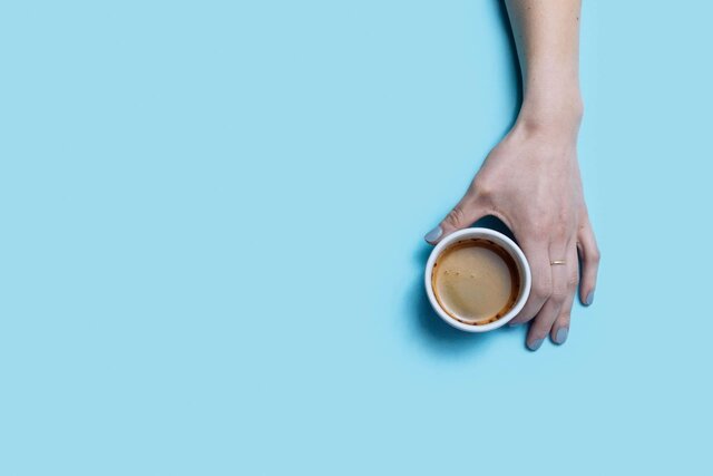 hand holding espresso