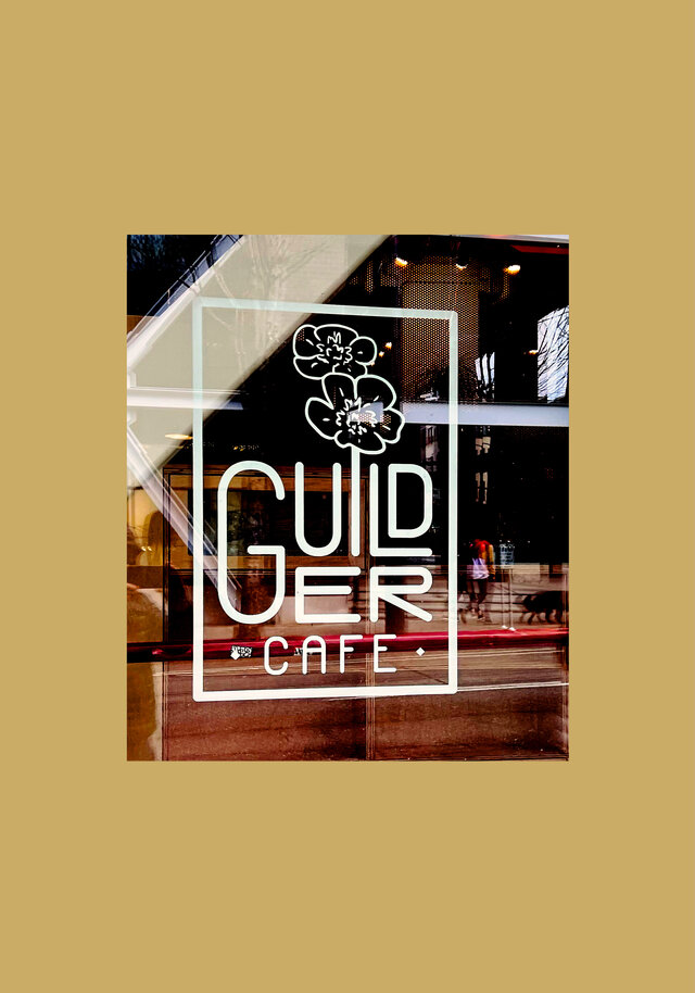 Guilder logo in Powell's Book window, we are so excited about this