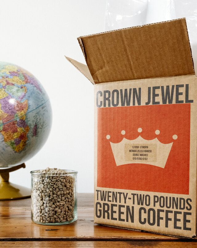 Royal Coffee crown jewel box featuring the new logo