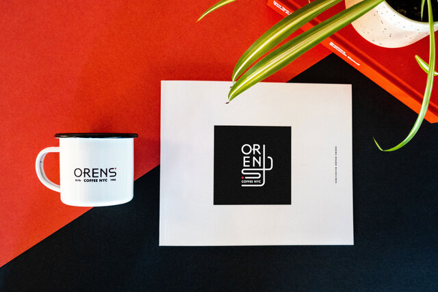 Oren's brand book and mug
