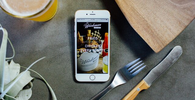 Woodsman Tavern website