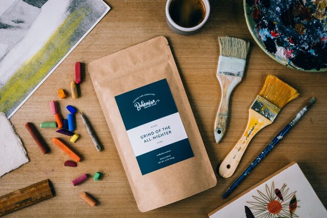 Bohemian Coffee Club coffee bag surrounded by art supplies