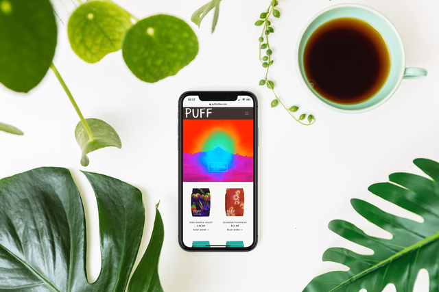 Puff Coffee Homepage on an iPhone with green plants and coffee