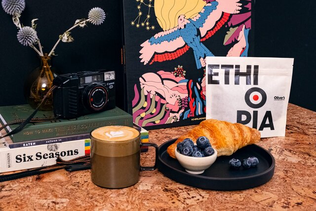 Ethiopia coffee packaging with a latte and records