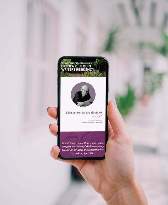 Hand holding an iPhone that shows the Ursula K. Le Guin Writers Residency page on the Literary Arts website, featuring the quote "First sentences are doors worlds."